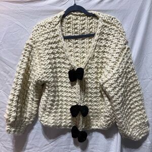 Chunky Knit Cream Sweater with Black Snap Bows